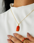 Coral Ganesha 18K Gold Pendant