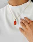 Coral Ganesha 18K Gold Pendant