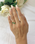 Anillo de dos flores con esmeralda y diamantes