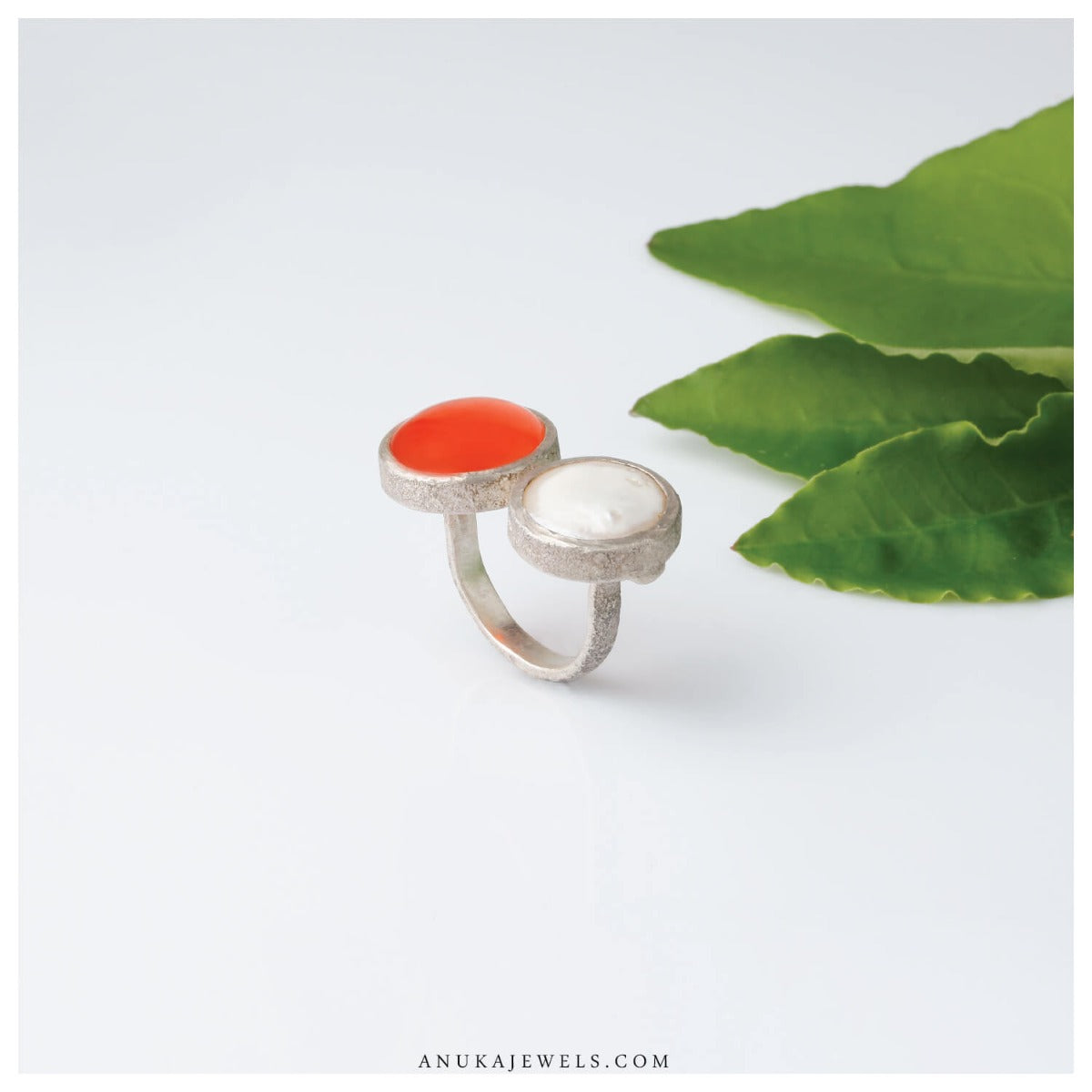 silver orange ring