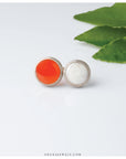 orange silver ring