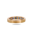 18K rose gold eternity ring side profile showing flat band width and depth, blue sapphire and diamond