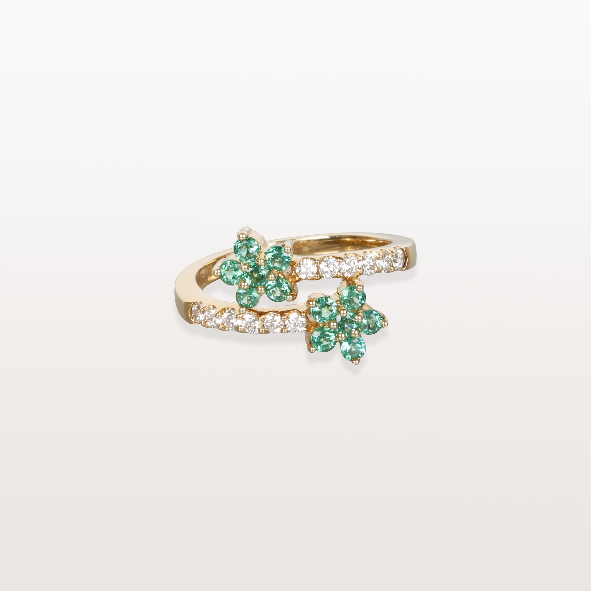 Anillo de dos flores con esmeralda y diamantes