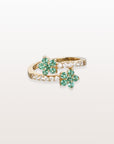 Anillo de dos flores con esmeralda y diamantes