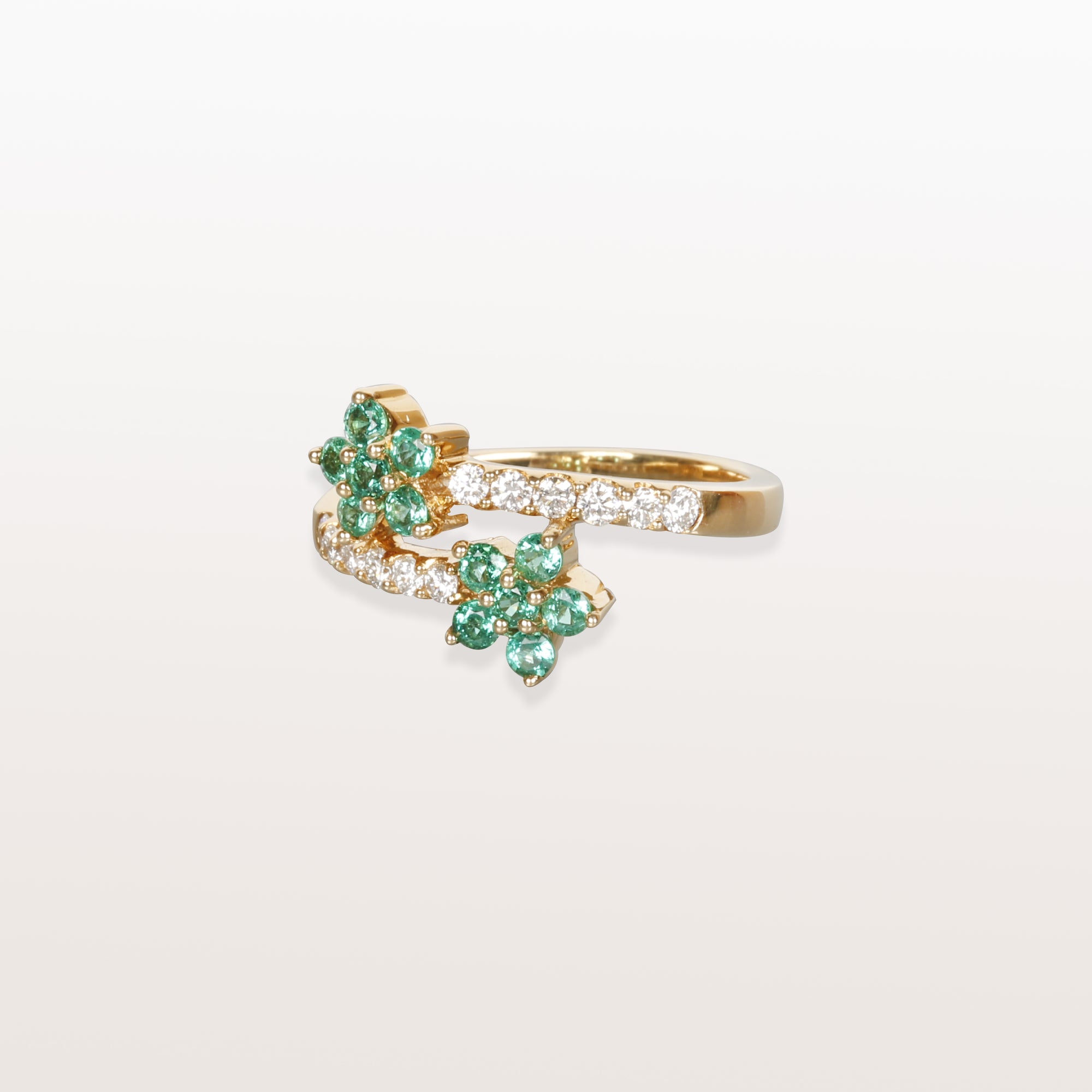 Anillo de dos flores con esmeralda y diamantes