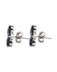 Oval cut blue sapphire flower set in sterling silver earrings