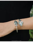 Triangular end abalone bangle