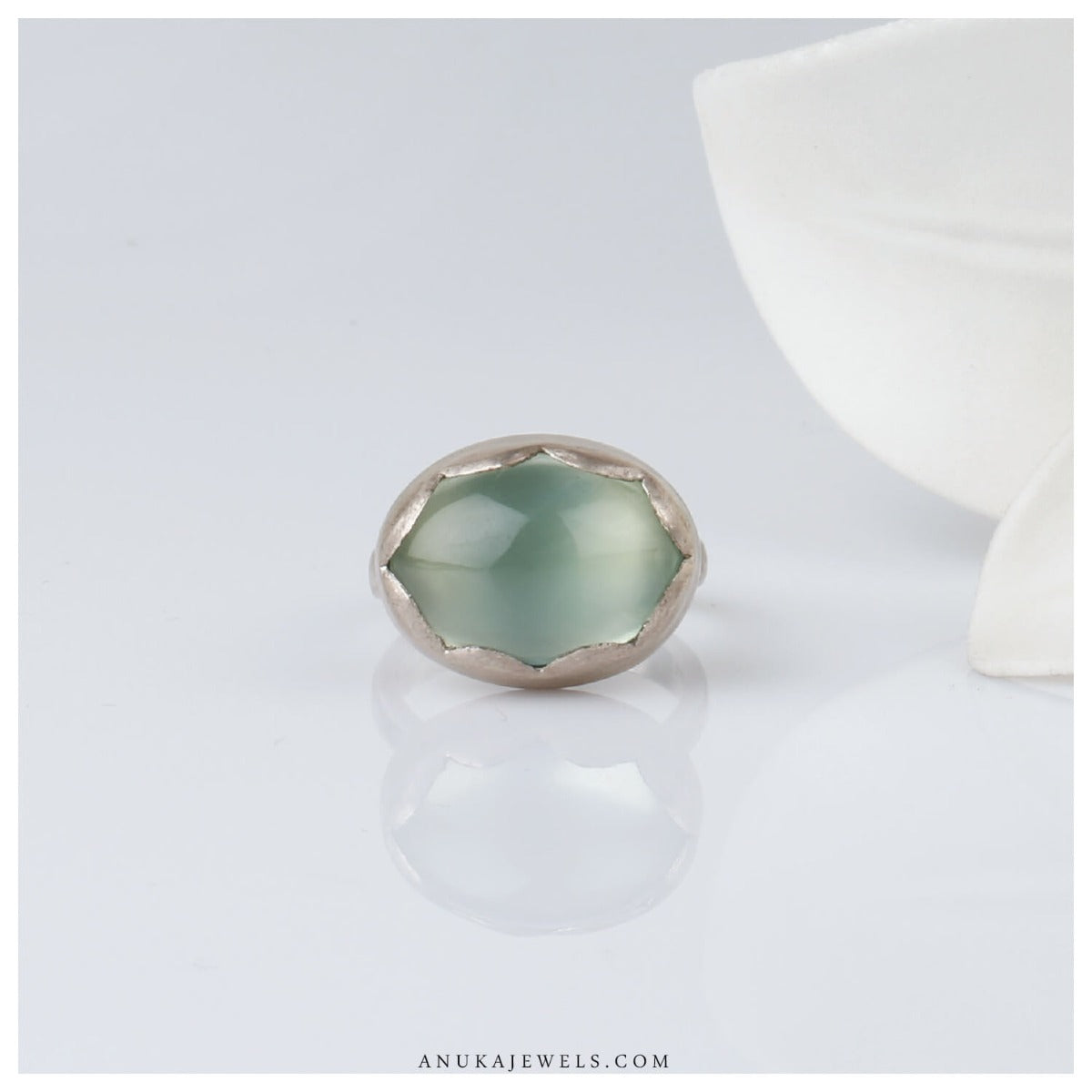 silver green ring