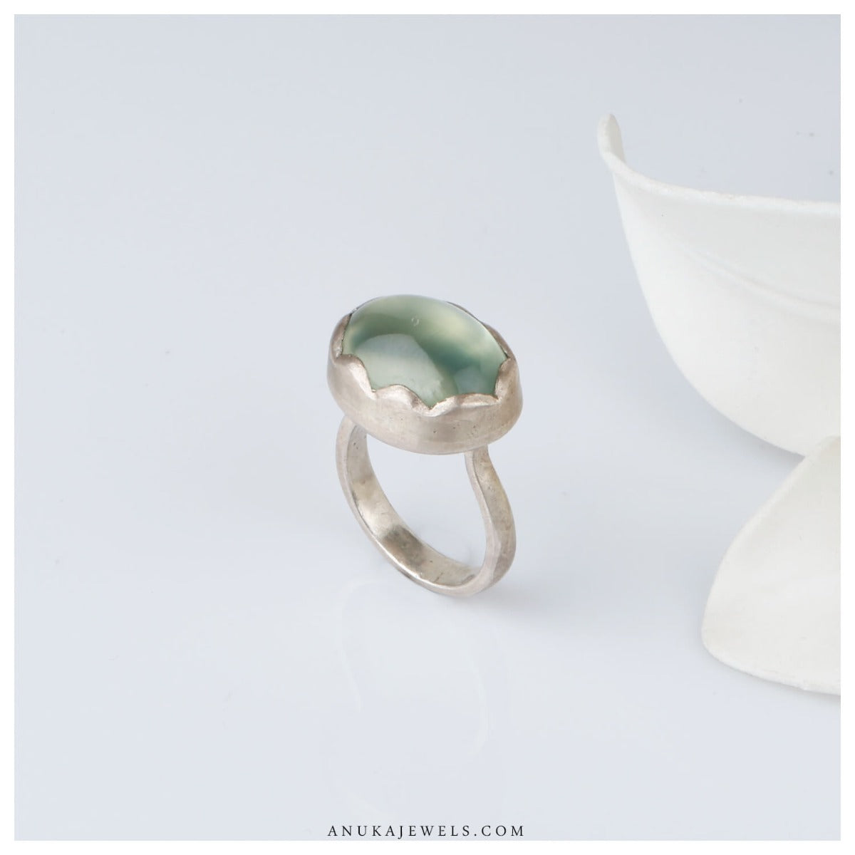 green silver ring