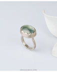 green silver ring