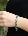 Charismatic diamond and emerald bracelet