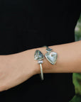 Triangular end abalone bangle