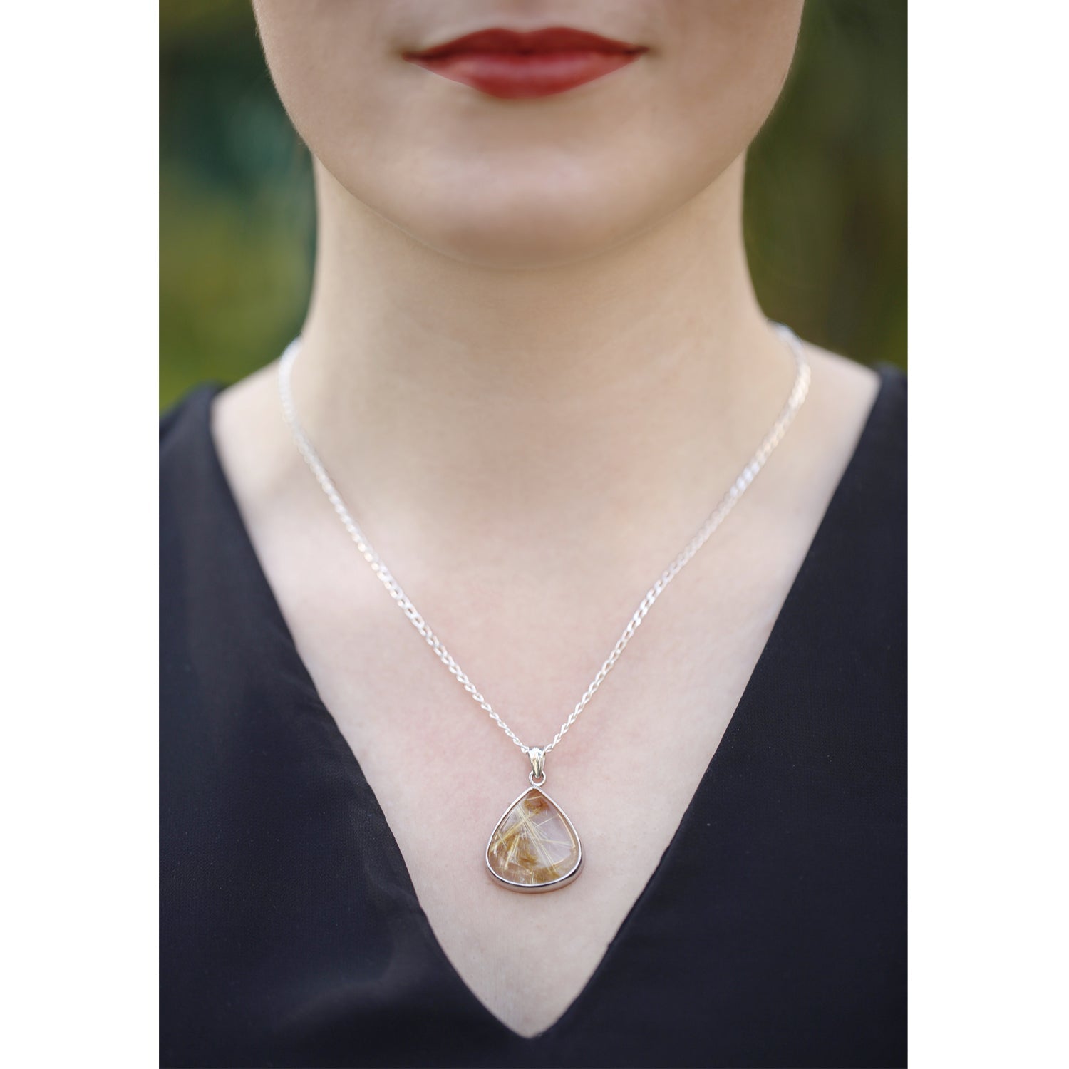 Silver Pendant with Rutile