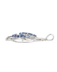 Pave diamonds and oval cut sapphire in silver leaf pendant