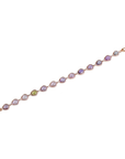 Rose gold multi gemstone diamond halo bracelet laid flat showing full length, amethyst peridot and blue topaz free-form stones with pavé diamond surrounds, lobster clasp detail