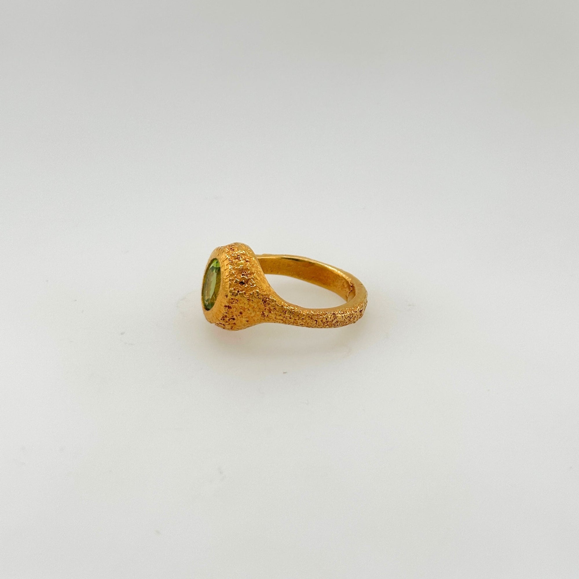 Peridot ring with gold finish